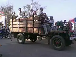 Jugaad vehicle carrying passengers to a political rally in Agra, India