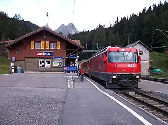 Railway station in Preda with an electrified regional RegioExpress (RE) train