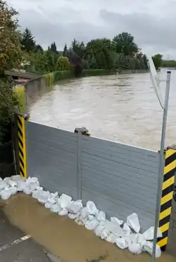 Sandbags and flood wall holding flood waters in Otrokovice, Czech Republic