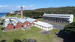 A red brick building and a limestone building at Point Nepean Quarantine