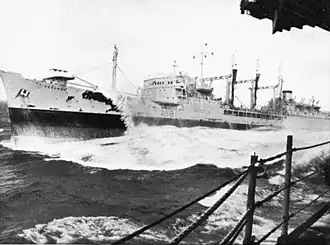 RFA Tidesurge (A98) refuels the US Navy aircraft carrier USS Forrestal on 25 August 1967, in heavy seas between Madagascar and the Cape of Good Hope