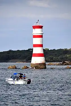 The Rangitoto Lighthouse is located along the Rangitoto Channel