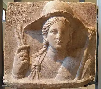 Relief of Isis, holding grain