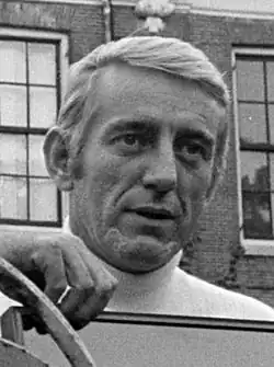 Black-and-white picture of Rod McKuen looking far away.