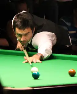 Ronnie O'Sullivan lining up for a shot