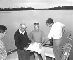 Image 33Roy O. Disney inspecting design plans on-site in Florida (from Walt Disney World)