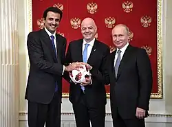 Image 29Russia handing over the symbolic relay baton for the hosting rights of the 2022 FIFA World Cup to Qatar in June 2018 (from Political corruption)