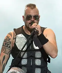 Joakim Brodén of Sabaton is known for wearing a distinctive vest with metal plates when performing with the band.[27][28][29]