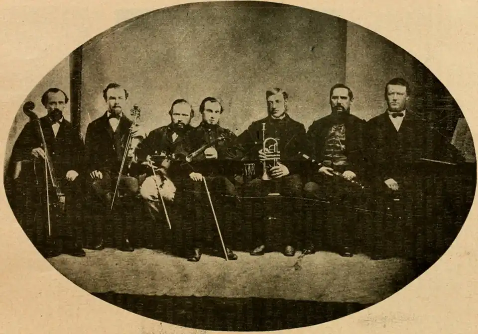 Salt Lake Theatre Orchestra 1868.From Left to Right: Joshua Midgley (Bass), Ebenezer Beesley (Cello), David W. Evans (Violin), George Careless (Director, violin), Mark Croxall (Cornet), Horace K. Whitney (Flute), Orson Pratt Jr. (Piano).