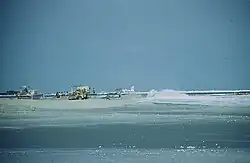 A diver smiling underwater.