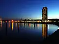 Skyline of Lübeck-Travemünde with the oldest lighthouse on the German Baltic coast and Maritim Hotel on the Travemünde promenade