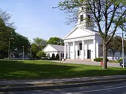 Slatersville Green in Rhode Island and the Congregational Church meeting house which the Slaters constructed and attended