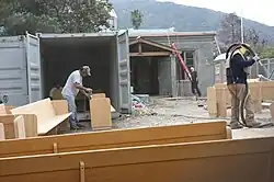 Heroic on-site refinishing of Saint Anne's pews