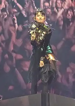 Nakamoto performing in May 2025