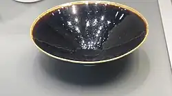 Rare black-glazed bowl, Northern Song, with copper rim.
