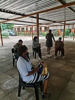 Teachers keeping a safe distance.