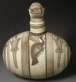 Terracotta barrel jug with strainer, Cyprus, 750-600 BCE.[2]
