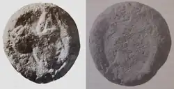 Another weathered coin