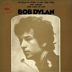 A record cover, with Bob Dylan pictured from the neck up