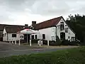 The Bell public house stands on the village green