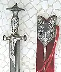 Talwar hilt without knuckle bow, with extensive silver koftgari decoration
