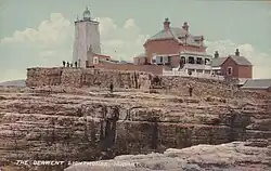 Iron Pot lighthouse with the Parkinson family home c. 1910