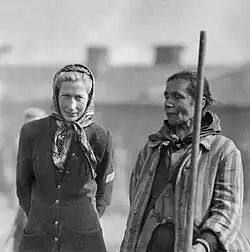 Liberated Bergen-Belsen survivor with a late war ersatz variant (left) showcasing no cloth patch, but a prominent N marked on the outer clothes