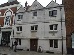 A three-storey house of dressed ashlar