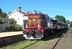 Diesel museum locomotive with excursion train, 2002
