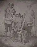 Manuelito, Barboncito, and Navajo boy and man, 1868