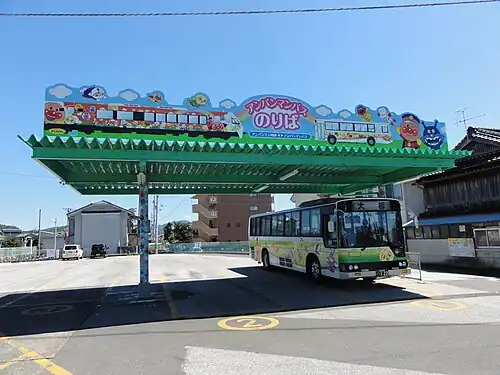 Bus stop in front of the station