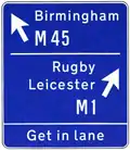 Design for second advance direction sign for a junction of two motorways.