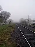 The rail lines of the Railway General Roca, photographed during a clouding morning.