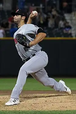 A baseball player in gray