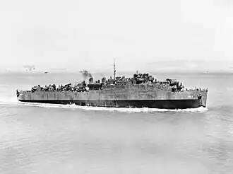 USS Belle Grove (LSD-2) undergoing sea trials in San Francisco Bay, 16 August 1943.