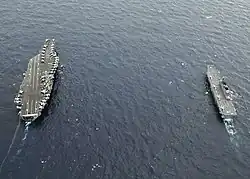 JS Hyūga and USS George Washington on 17 November 2009.