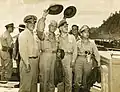 US Navy officers with President Osmeña and Carlos P. Romulo