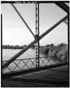 View: Looking southwest, showing vertical, diagonal, and guardrail detail