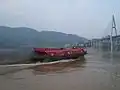 A hydrofoil boat leaving the Badong Port
