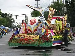 "Freedom Bird" parade float, ridden by women and children