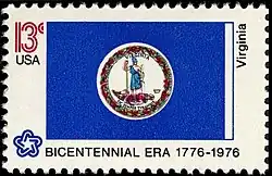 The Virginian state flag as depicted in on a 1976 postage stamp commemorating the U.S. bicentennial, including silver fringe on the fly.