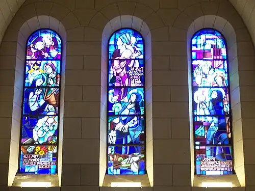 Left transept windows: "The Nativity", "The Annunciation", "The Presentation at the Temple"
