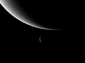 Image 35Neptune and its moon Triton, taken by Voyager 2. Triton's orbit will eventually take it within Neptune's Roche limit, tearing it apart and possibly forming a new ring system. (from Formation and evolution of the Solar System)