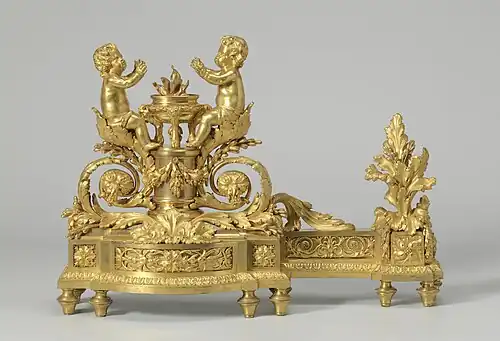 Firedog with putti that warm themselves at a flame; 1780–1790; gilt-bronze; height: 34.5 cm; Rijksmuseum