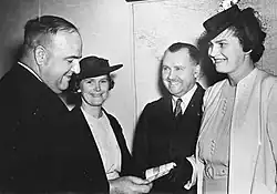 a black and white photograph of a group of people