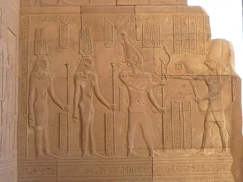 Wall relief of Cleopatra III, Cleopatra II and Ptolemy VIII before Horus