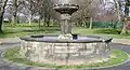 The octagonal fountain is dated 1897[7]