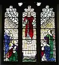 Window above the chancel arch in memory of Revd J Smaridge. By Horace Hincks and Pope & Parr 1946.