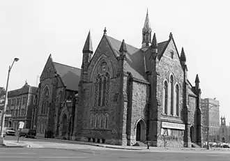 Woodward Avenue Baptist Church built in 1887 by the architects Mortimer Smith & Sons and reformed for the 1936 Woodward widenning was destroyed by fire 1986.
