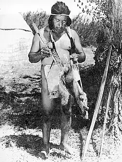 Yokute with a gray fox pelt as a quiver